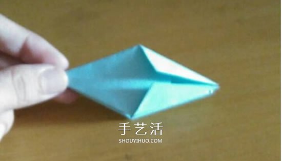 怎么折漂亮纸花 手工折纸八角星花的折法图解