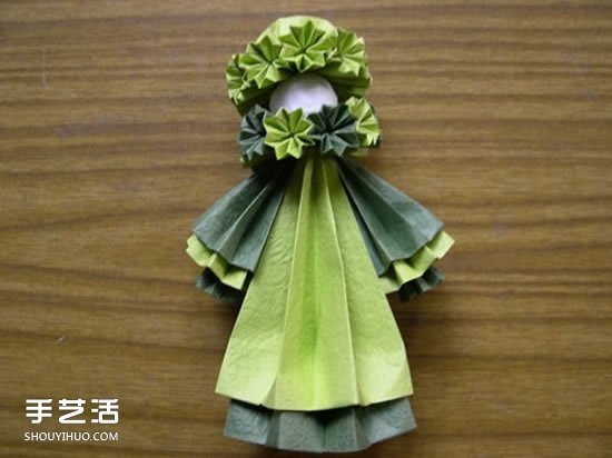 折纸娃娃的制作方法 穿裙子娃娃的折法图解