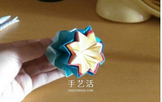 怎么折漂亮纸花 手工折纸八角星花的折法图解