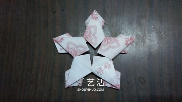 五瓣莲的折纸方法图解 纸币折五瓣莲的步骤