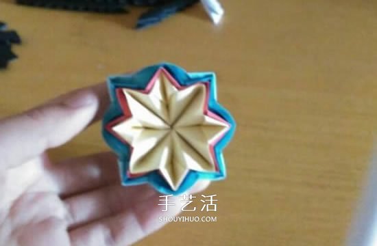 怎么折漂亮纸花 手工折纸八角星花的折法图解