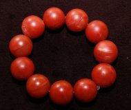 【南红百科】鉴赏柿子红南红玛瑙手串的方法